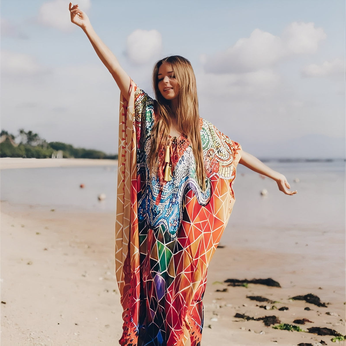 Robe Paréo aux Motifs Africains portée à la main - Orange