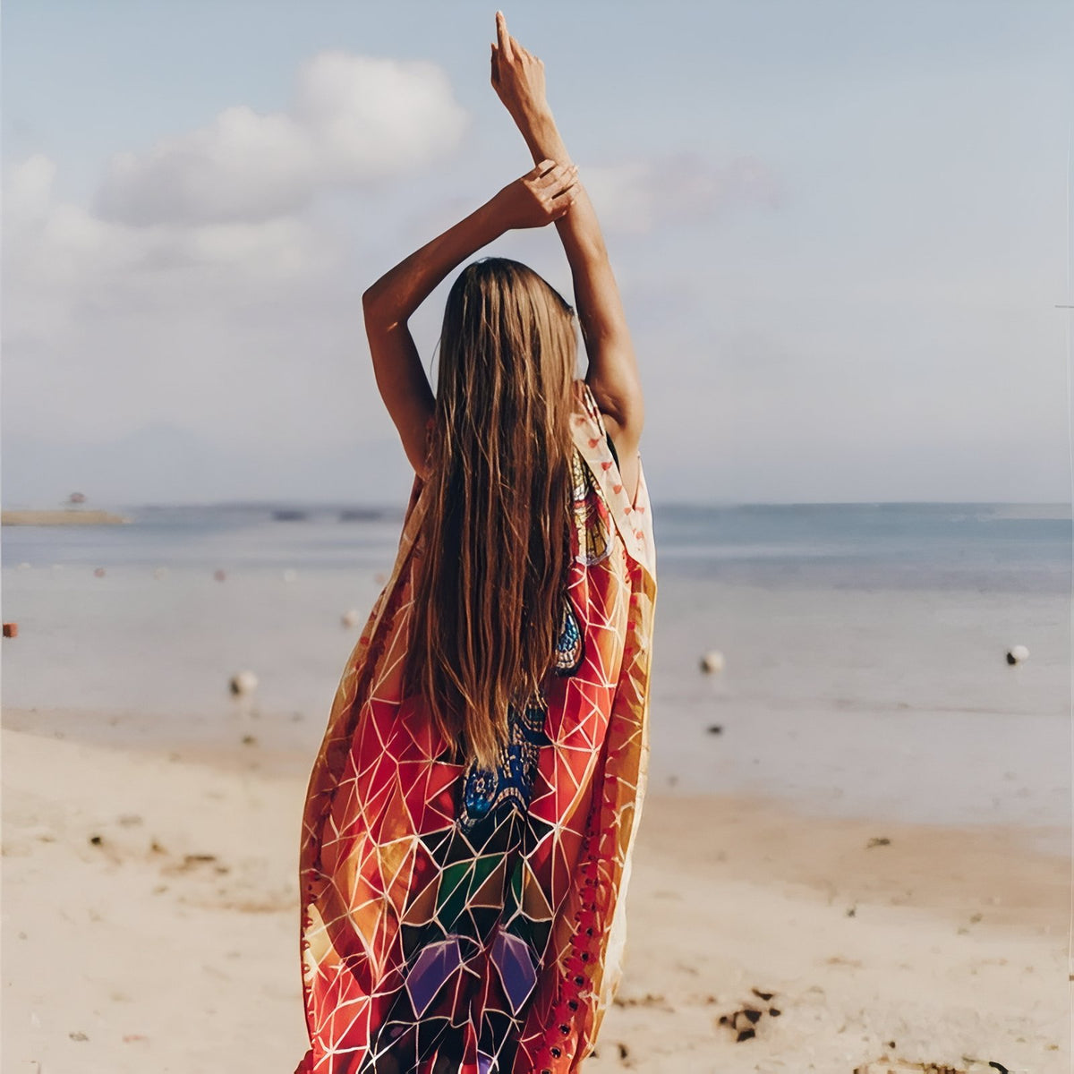 Robe Paréo aux Motifs Africains portée à la main - Orange