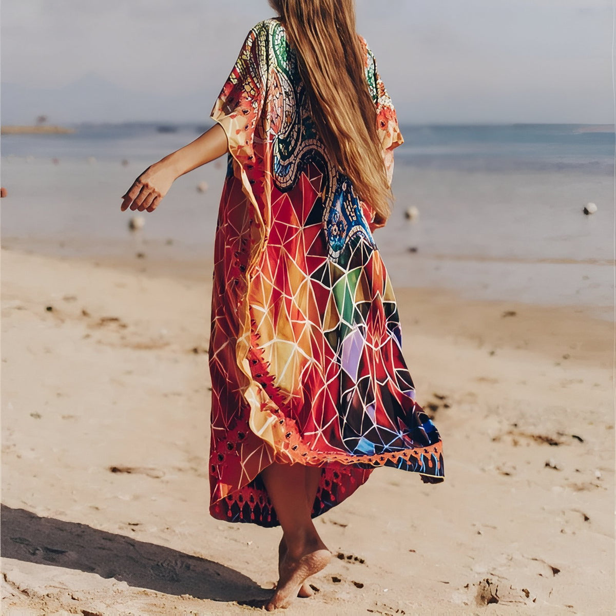 Robe Paréo aux Motifs Africains portée à la main - Orange