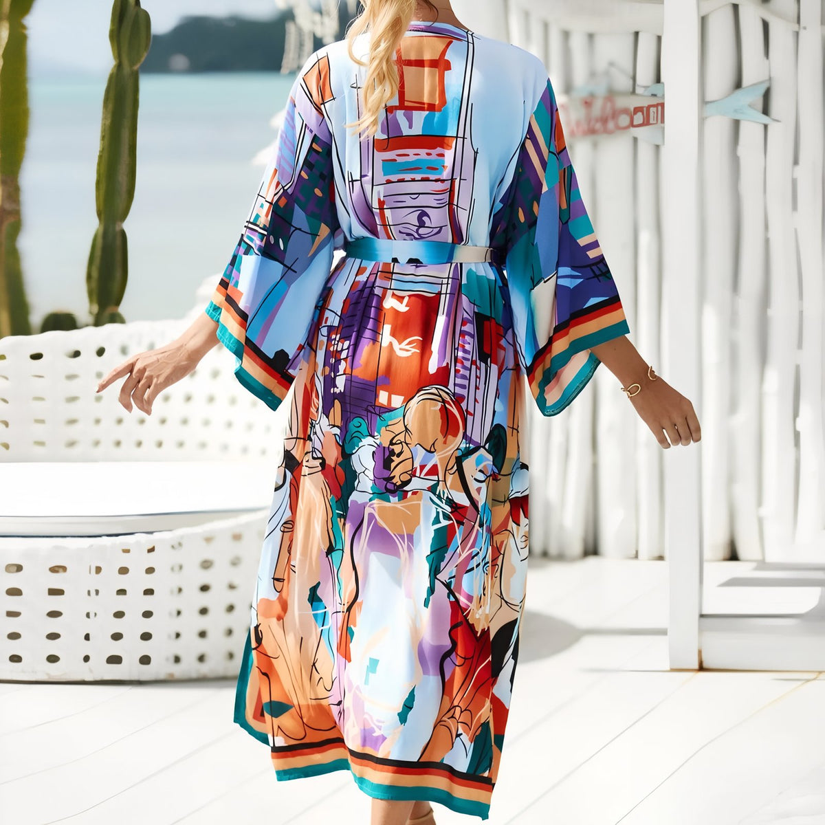 Kimono de Plage Grande Taille Imprimé Eté portée de dos - Paisley Coloré - Feuilles vertes - Beige - Multicouleurs - Bleu Azur - Turquoise - Aigle Sauvage - Noir - Formes géométriques - Rouge et Bleu - Fuchsia Tie Dye
